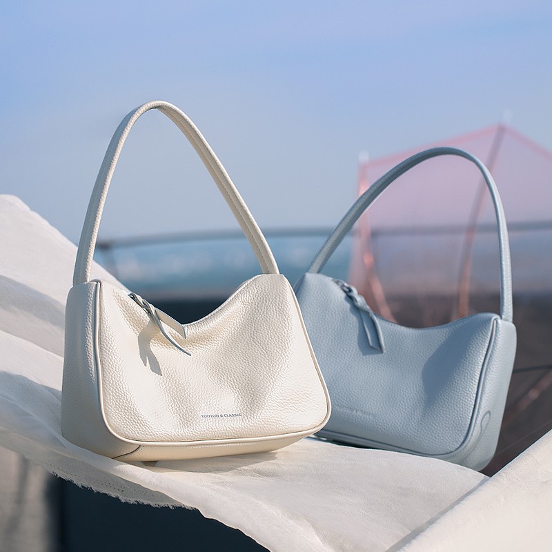 PLUS会员:toutou 牛皮单肩手提包 米白 TT22A4588 87.86元(需领券)